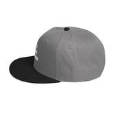 Snapback Hat in navy blue with flat visor and structured design, side view showcasing high-profile style.