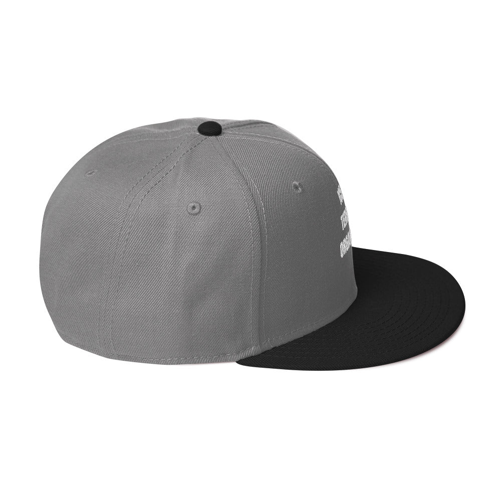 Snapback Hat in navy blue with flat visor and structured design, side view showcasing high-profile style.