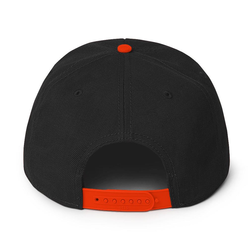 Back view of a Snapback Hat featuring a black body and an orange snap closure for adjustable fit.