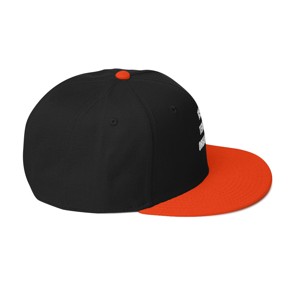Snapback Hat in navy blue with flat visor and structured design, side view showcasing high-profile style.
