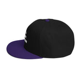 Snapback Hat with black fabric and purple flat visor, featuring structured 6-panel design and plastic snap closure.